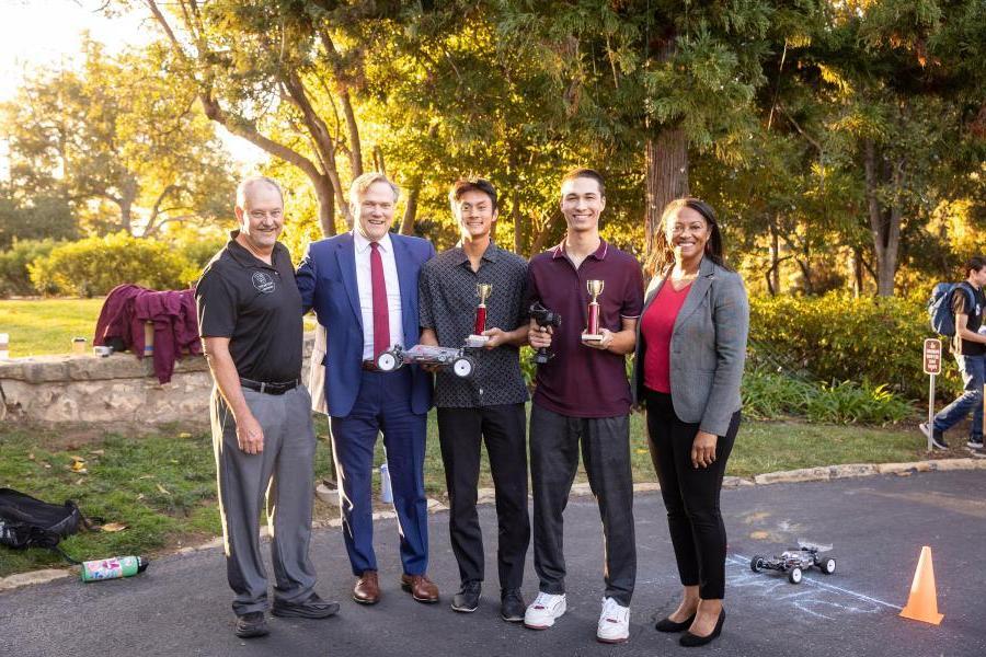 Winners Tim Horsey and Noah Shen pose with Provost Kim Denu, President Gayle D. Beebe and director Dan Jensen